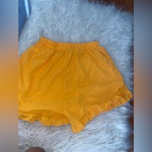 Yellow lose fitting shorts